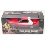 An American Muscle by ERTL 1/18 scale model of a Starsky & Hutch Ford Gran Torino, housed in the