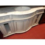 A contemporary French style grey painted and white variegated marble topped bowfront vanity unit,