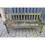 A slatted teak three-seater garden bench, w.157cm