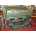 A green leather buttoned upholstered two-piece country house Chesterfield suite, comprising three-