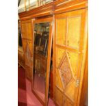 A late Victorian oak and burr oak triple wardrobe, partly dismantled, w.220cm With losses and