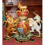 A painted and gilt composite Royal coat of arms wall hanging, 75 x 69cm