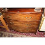 A Regency mahogany bowfront chest of three long graduated drawers, on splayed bracket supports, w.