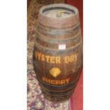 A coopered oak Sherry barrel, with stopper, titled in script 'Oyster Dry Sherry', h.51cm