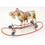 Steiff Riding/Rocking Horse on wheels, German, mid-20th century example comprising cream fur with