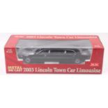 A Sunstar No. 4202 1/18 scale model of a 2003 Lincoln Town Car Limousine finished in black and