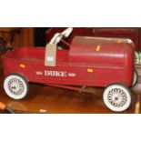 A mid-20th century child's painted pedal car (overall poor and well-used condition), length 74cm