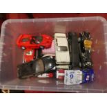 A box of mainly 1:18 and 1:24 scale diecast vehicles, to include Burago