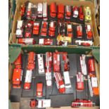Two trays of mail order release 1:43 scale emergency services and fire service vehicles