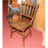A set of eight early 20th century elm and beech slatback kitchen chairs; together with a further