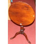 A 19th century mahogany circular tilt-top pedestal tripod occasional table, dia.49cm