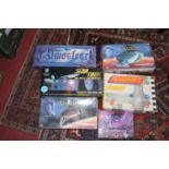 A collection of sci-fi related plastic kits, together with a quantity of board games to include