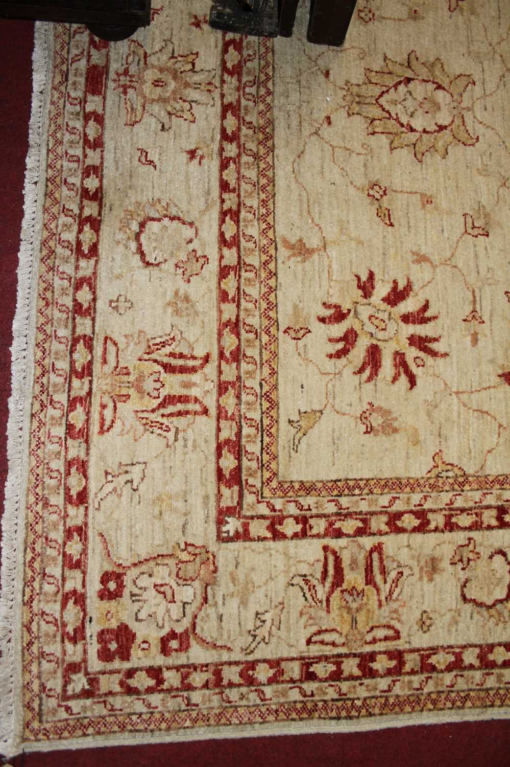 A Persian style machine woven cream ground rug, 240 x 175cm - Image 2 of 4