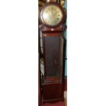 A circa 1830 mahogany longcase clock, having a circular floral engraved brass dial, with