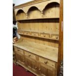 A contemporary pine kitchen dresser, w.152cm