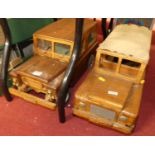 A pair of wooden constructed model Landrovers
