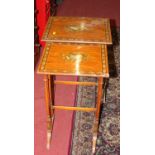 An early 20th century satinwood and floral polychrome painted nest of two occasional tables, on