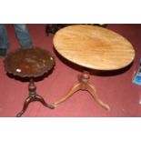 A 19th century faded mahogany circular tilt-top pedestal tripod table, dia.68cm; together with a