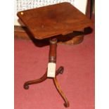 An early 19th century mahogany fixed top pedestal tripod occasional table, raised on umbrella scroll
