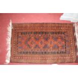 A small Persian woollen prayer rug, having multiple trailing tramline borders, 140 x 84cm