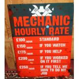 A contemporary laminate on metal wall sign titled 'Mechanic hourly rate', 70 x 50cm