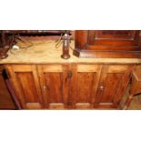 A late Victorian pine four door dresser base (lacking upper section), w.128cm