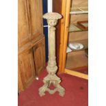 A painted and carved wood torchere stand, in the classical taste, h.126cm