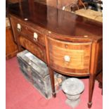 A 19th century mahogany, flame mahogany and further strung bowfront sideboard, having twin central