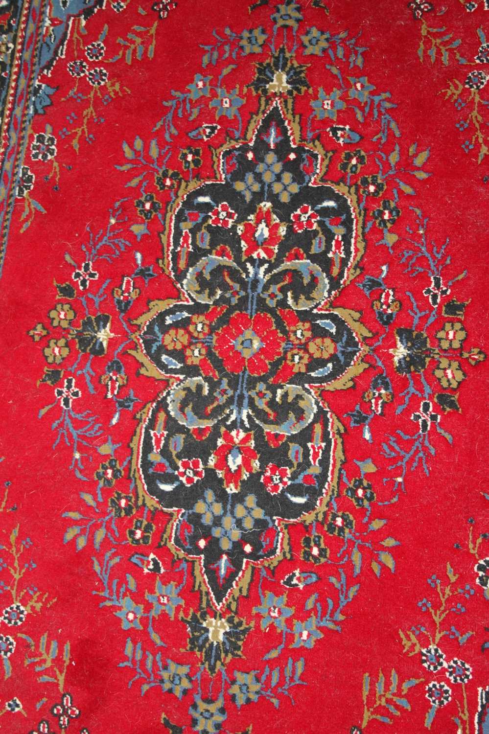 A Persian style red ground woollen Tabriz long hall runner, 395 x 98cm - Image 2 of 3