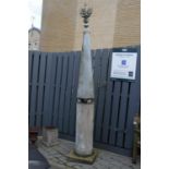 A large and unusual galvanised metal garden sculptural obelisk, with flower head finial to plain