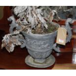 A Victorian lead twin handled urn shaped planter, on flattened circular base, w.47cm (including
