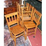 A set of six mid-20th century beech slatback chapel chairs