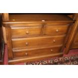 An Ercol mid-elm 'Golden Dawn' low chest of two short over two long drawers, w.100cm