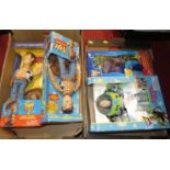 Two trays containing a quantity of Toy Story related collectables to include Buzz Lightyear and