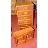 A contemporary yew wood and brass bound narrow chest of seven drawers, w.42.5cm; together with a