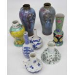 A collection of ceramics to include a Chinese stem cup, a pair of flambe glazed vases of baluster