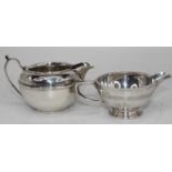 A George V silver cream jug, together with one other George V silver cream jug, gross weight 7.