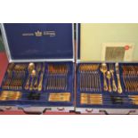 Two Besteck West German twelve-place setting canteens of gold plated cutleryBoth canteens with two