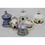 A collection of six Victorian Staffordshire pastille burners, each in the form of a cottage, largest