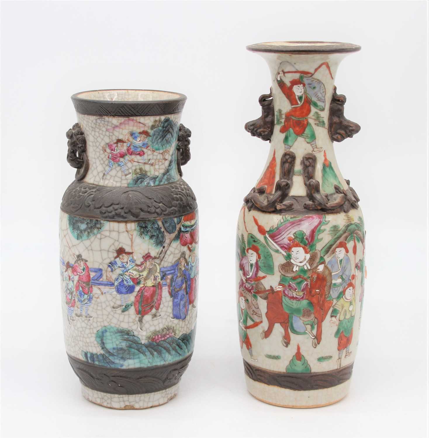 A Chinese Nanking vase, enamel decorated with figures, h.29cm; together with another smaller example