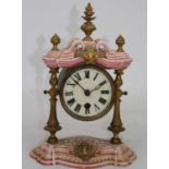 A continental porcelain cased mantel clock, the dial showing Roman numerals, h.29cm