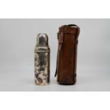 A mid-20th century Autotherm motorists flask, in a brown stitched leather case, h.28cm.