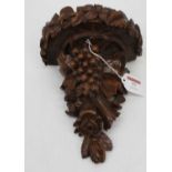 A continental carved beech wall bracket in the form of vines, h.20cm