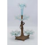 An early 20th century gilt metal figural table epergne, having frilled vaseline glass sections,