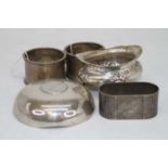 A small collection of miscellaneous silver items to include a pair of George V silver napkin