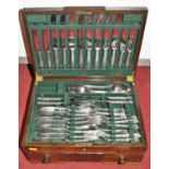 A 1930s oak cased canteen of silver plated cutlery in the Kings pattern, eight-place setting (