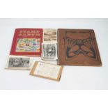 A collection of vintage stamps and photographs, to include two schoolboy albums