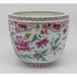 A Chinese porcelain jardiniere, enamel decorated with flowers, h.24.5cmIn good condition