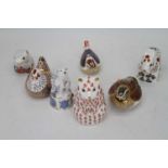 A collection of six Crown Derby desk ornaments, in the form of an animal or bird, to include hen,