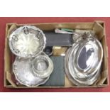 A box of silver plated items, to include entree dishes
